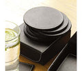 Set of Six Black Faux Leather Round Coasters with Holder